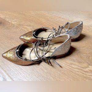 STUART WEITZMAN. Women’s Gilligan Lace Up Gold-Silver Glitter Ballet Flats.